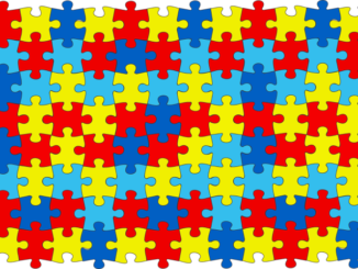 Prostokąt ułożony z puzzli w kolorze żółtym, niebieskim i czerwonym